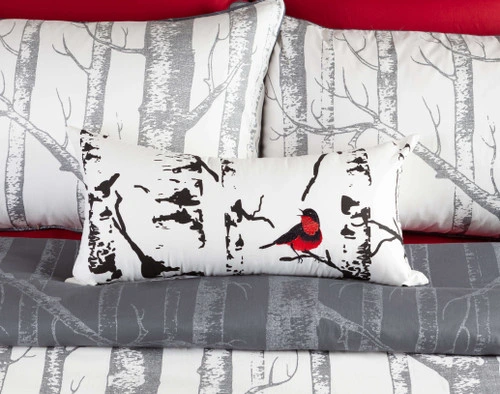 Birchgrove Boudoir Cushion Cover features embroidered bird details in red and grey on a printed black and white background.