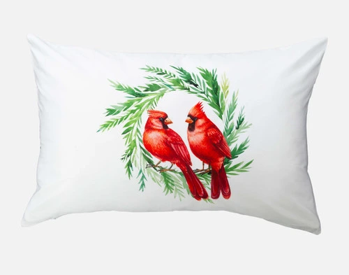 Front view of our second Cardinals Pillow Talk Pillowcase with two red cardinals sitting on a holly wreath.