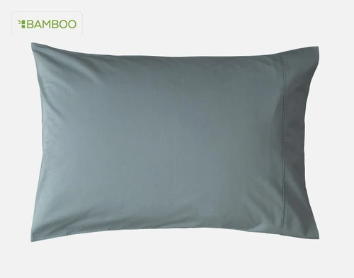 Front view of one of our Bamboo Cotton Pillowcase in Spruce Green sitting against a solid white background.