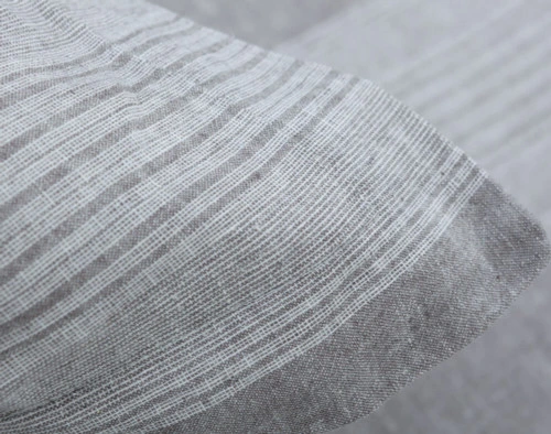 Close up of textured linen blend on pillow sham.