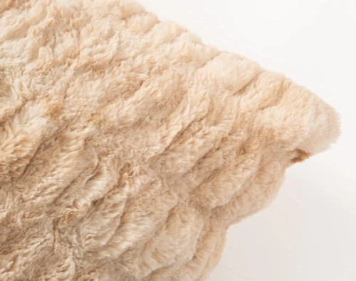 Carved Faux Fur Euro Sham in Caramel, a medium beige with orange undertones, corner close-up