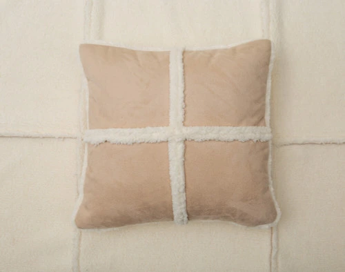 Windowpane Shearling Square Cushion pictured with BeechBliss Sheet Set in Cloud.