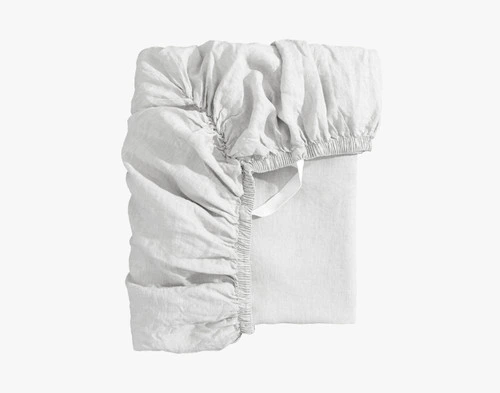 Front view of our Signature European Linen Fitted Sheet in White folded neatly into a tidy square.