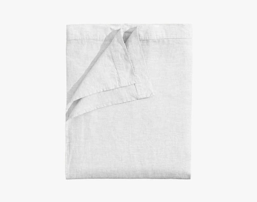 Our Signature European Linen Flat Sheet in White folded neatly into a tidy square.