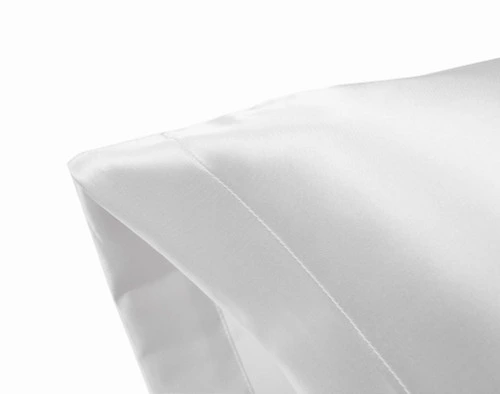 Corner of an White Satin Pillowcase showing envelope fold