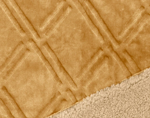 Close up of pattern and sherpa reverse of Diamond Etched Throw in Gold.