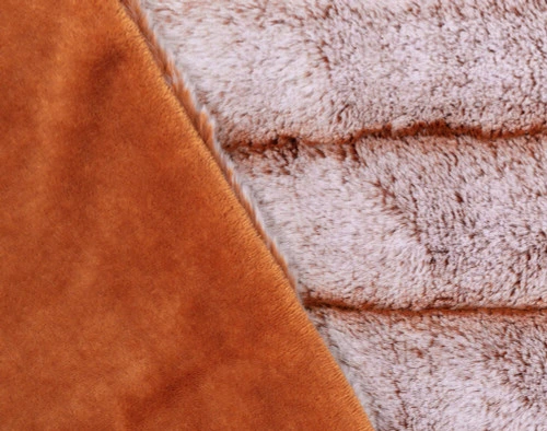 Close-up of Tip-Dyed Faux Fur Throw in Copper to show solid reverse texture.