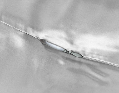 Close-up of zipper closure on our Silk Duvet Cover in Silver.