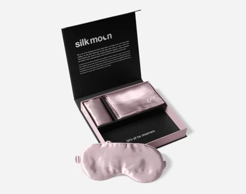 Our Lavender Mulberry Silk Gift Set, opened with the pillowcase & delicates bag folded, while the eye mask is taken out near the front.