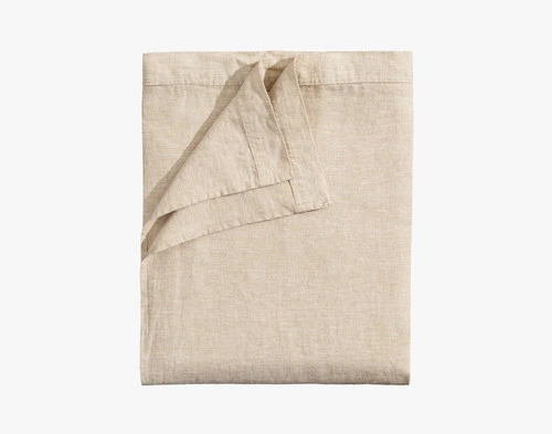 Our Signature European Linen Flat Sheet in Natural folded neatly into a tidy square.