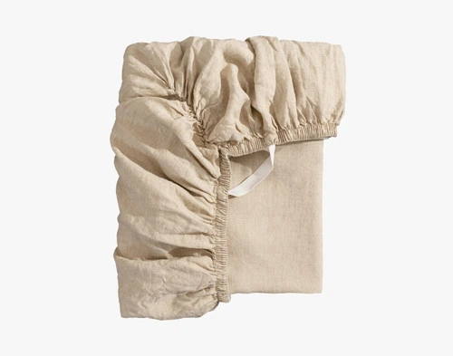 Front view of our Signature European Linen Fitted Sheet in Natural folded neatly into a tidy square.