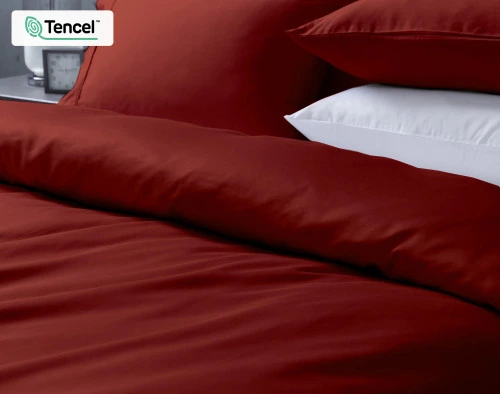 Folded top edge of our Eucalyptus Luxe TENCEL™ Lyocell Duvet Cover in Ruby to show its soft folded surface.