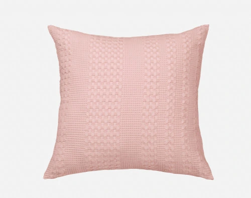 Our Waffle Cotton Euro Sham in Blush Pink sitting against a white background.