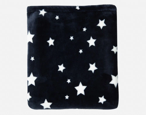 Our Kid's Fleece Velveteen Throw in Star folded into a tidy plush square.