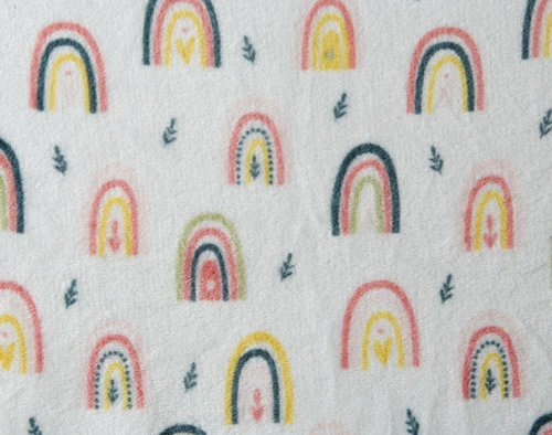 Close-up on the plush surface on our Kid's Fleece Velveteen Throw in Rainbow.