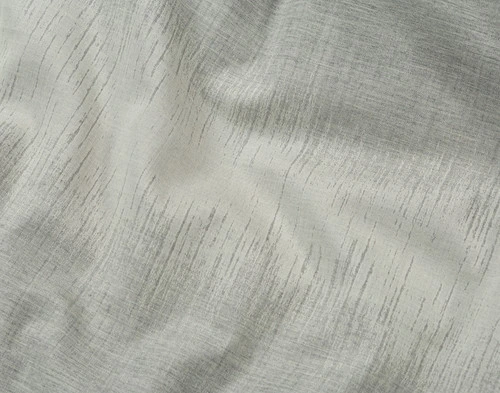 Close-up on our Benito Duvet Cover to show its ombré jacquard design in tones of grey