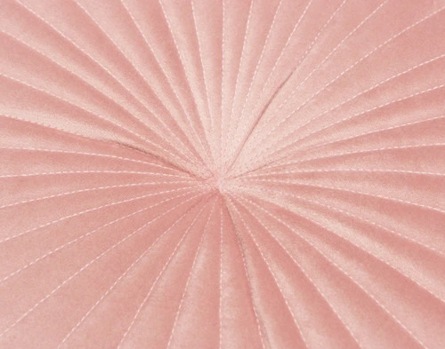 Close-up of our Round Mandarin Velvet Cushion in Blush Pink to show its geometric stitching.