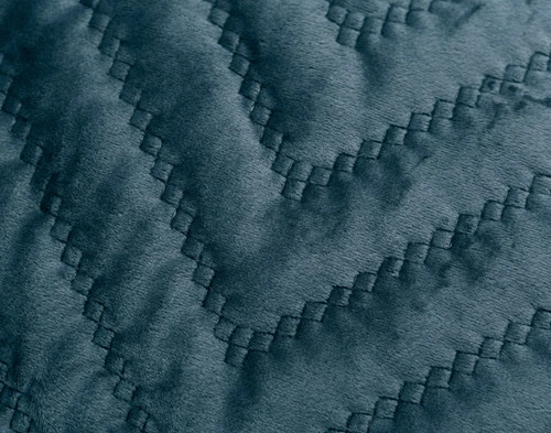 Close-up of the quilted texture of our Quilted Chevron Euro Sham in Teal.