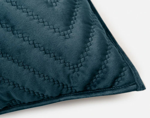 One closed corner of our Quilted Chevron Euro Sham in Teal.