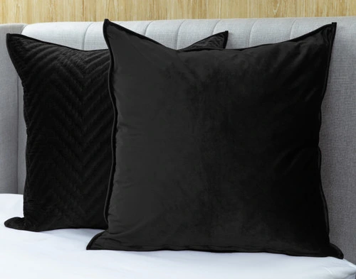 Pair of Quilted Chevron Euro Shams in Black to show both its patterned face and solid reverse side-by-side.