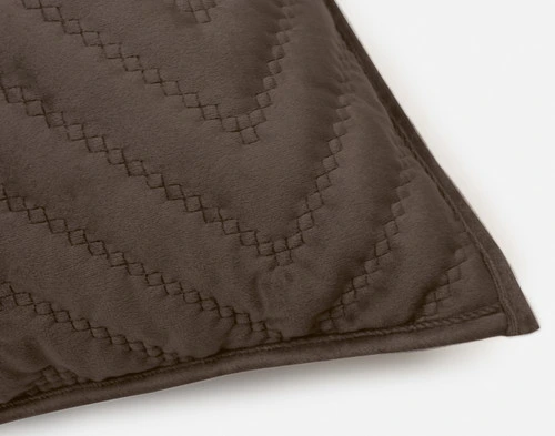 One closed corner of our Quilted Chevron Euro Sham in Java Brown.