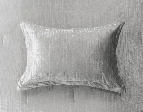 Top view of our pillow sham for our Avalon Quilt Set in Silver with coordinating velvet surface.