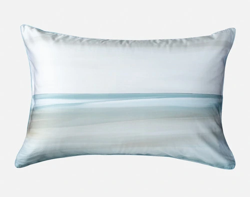 Front view of our Tidal Pillow Sham with coordinating blue and white ombre design.