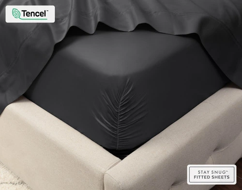 Close-up on the corner of a mattress with our Eucalyptus Luxe TENCEL™ Lyocell Fitted Sheet in Black Pearl to show its snug fit.