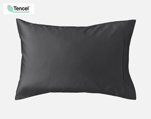 Front view of a Eucalyptus Luxe TENCEL™ Lyocell Pillowcase in Black Pearl wrapped over a pillow sitting against a solid white background.