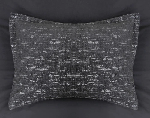 Top view of the pillow sham for our Flecks Duvet Cover Set with coordinating white etched pattern.