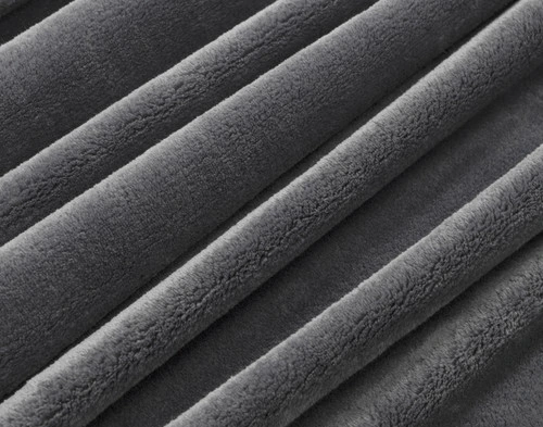 Close-up of some bunched up fabric from our Cashmere Touch Fleece Blanket in Volcanic Grey.