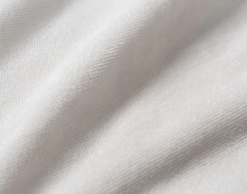 Close-up on ruffled smooth reverse on our Puma Faux Fur Throw in Winter White.