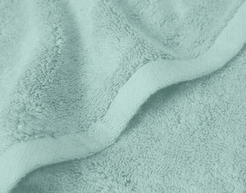 Close-up on the solid edge of our Modal Cotton Towels in Seafoam.