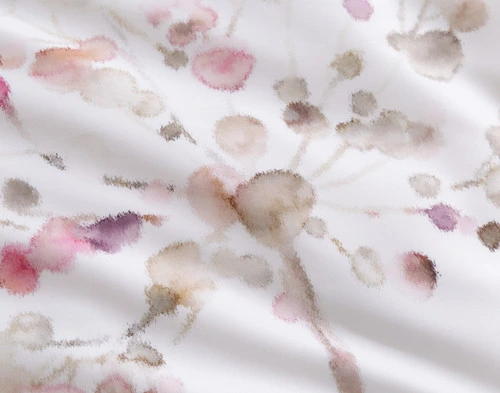 Close-up on our Angelica Duvet Cover to show its starburst floral design.