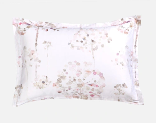 Front view of our Angelica Pillow Sham sitting against a solid white background.