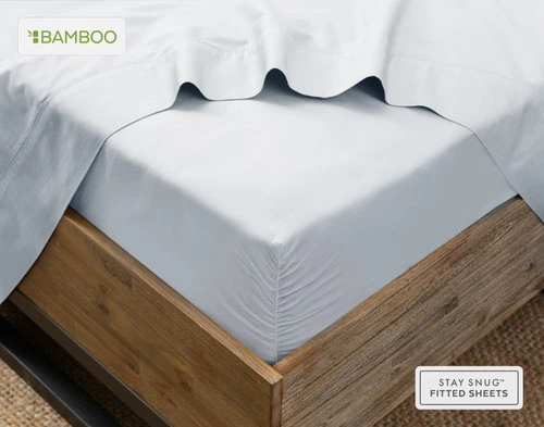 Angled view of our Bamboo Cotton Fitted Sheet in Pearl Blue snugly wrapped around a mattress.