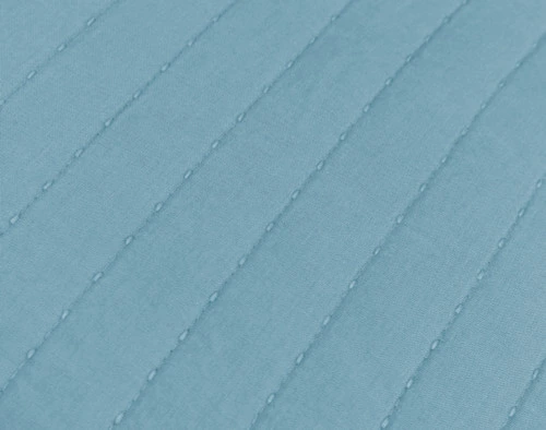 Close-up on the textural quilted lines on our Linen Cotton Euro Sham in Lake.