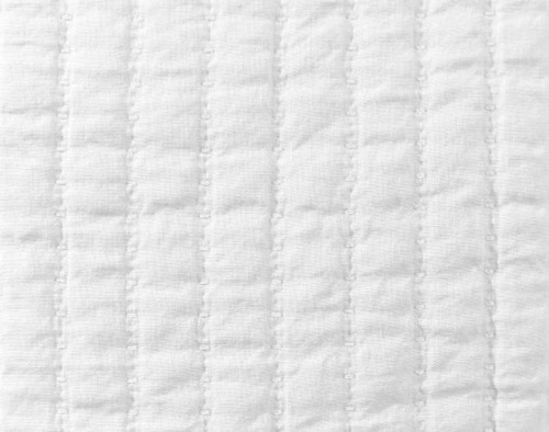 Close-up on the textural quilted lines on our Linen Cotton Square Cushion Cover in White.