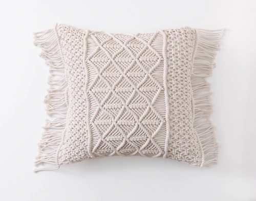 Front view of our Macramé Square Cushion Cover sitting against a solid white background.