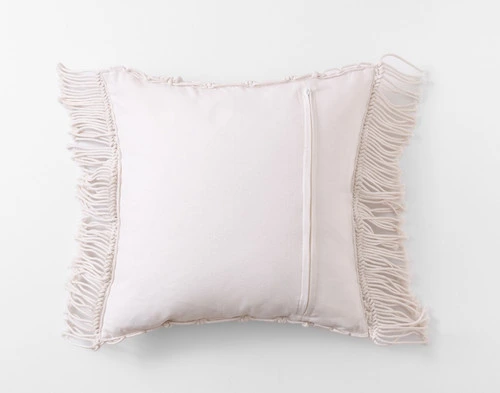 Back view of our Macramé Square Cushion Cover sitting against a white background to show its solid reverse.