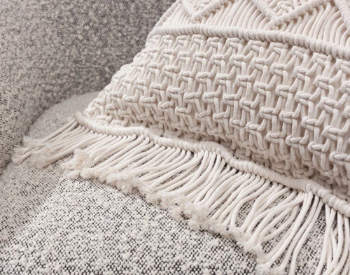 Close-up on the rope fringe tassels on the side of our Macramé Square Cushion Cover.