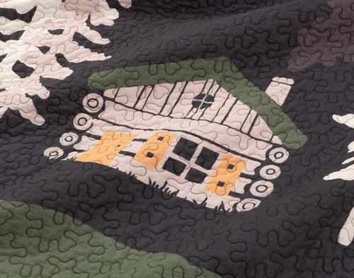 Close-up on our Rock River Cotton Quilt Set to show a small log cabin within its scenic design.