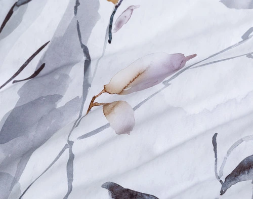 Close-up on the watercolour design on the surface of our Tamarak Duvet Cover.