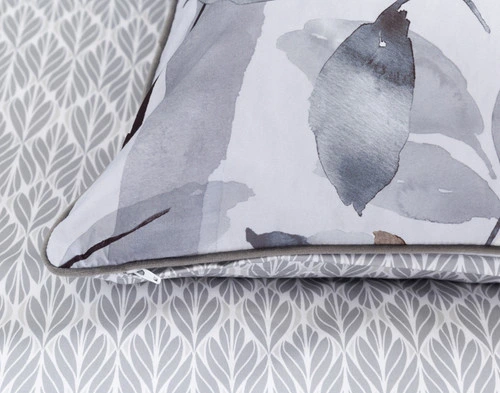 Close-up on our Tamarak Pillow Sham corner to show its piped edge and zipper enclosure.