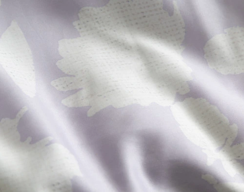 Close-up on the floral silhouetted backing on our Divine Duvet Cover.