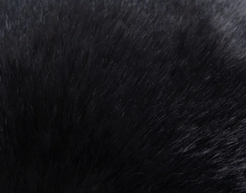 Close-up on the faux fur surface on our Polar Fur Euro Sham in Onyx Black.