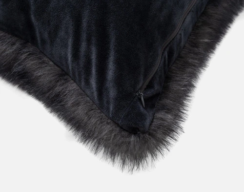 Close-up on the velvety smooth reverse and zipper enclosure on the corner of our Polar Fur Euro Sham in Onyx Black.