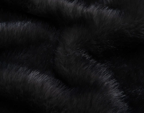 Close-up on the cozy faux fur surface on our Polar Fur Throw in Onyx.