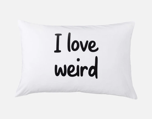 Front view of our first I Love Weird Pillow Talk Pillowcase to show its "I love weird" phrase.