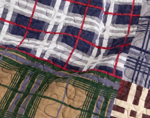 Close-up on the gingham designs in the patchwork pattern on our Harrison Cotton Quilt Set.